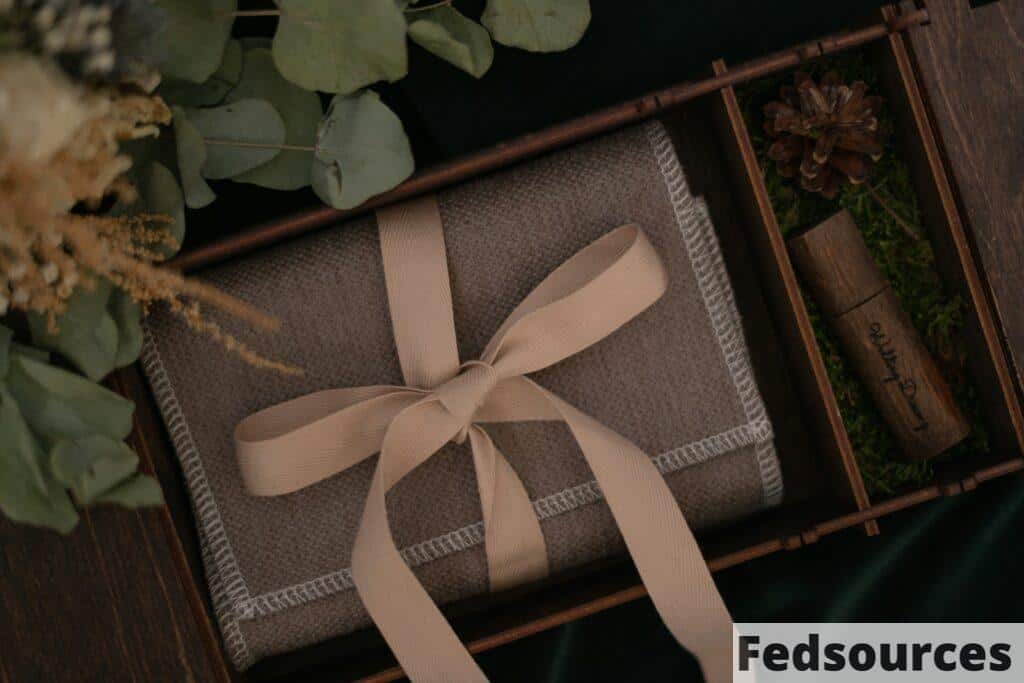 brown and black book on green leaves