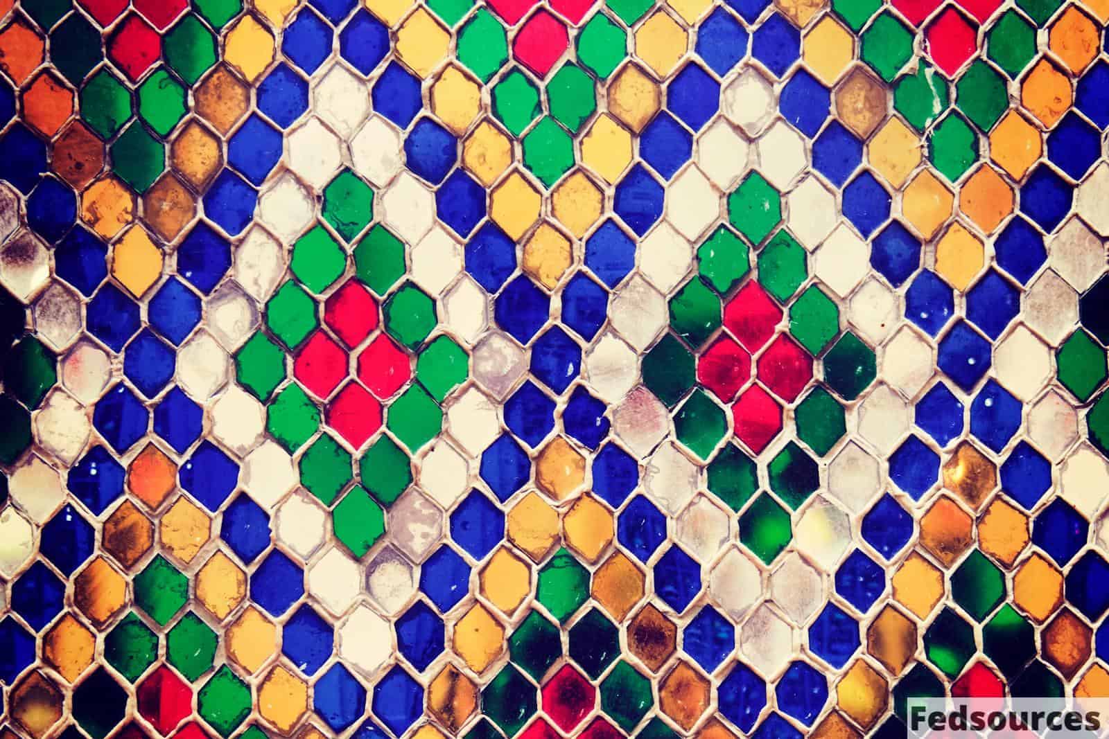 Vibrant mosaic pattern with hexagonal shapes and diverse colors, perfect for artistic and decorative themes.